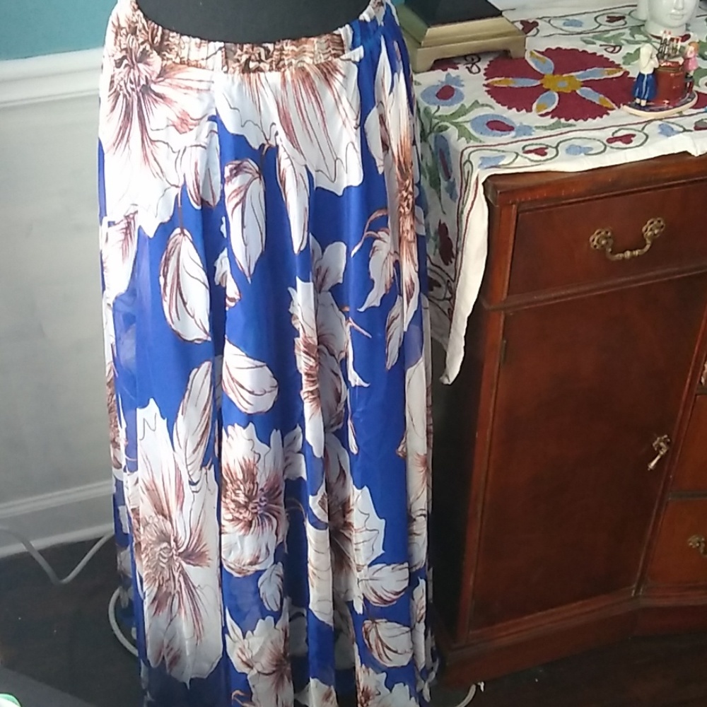 Long silk flower skirt.